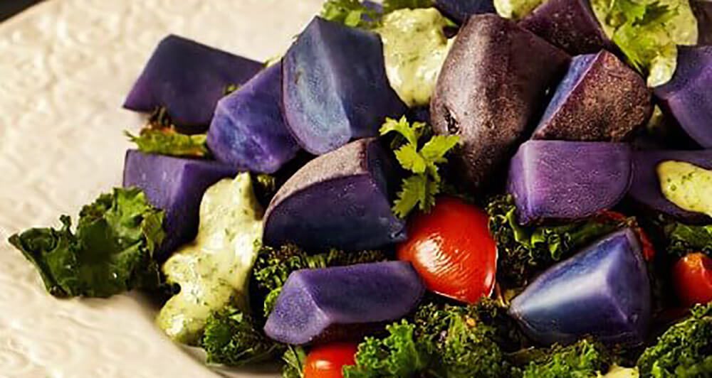 Purple Potato and Kale Salad with Cilantro-Tahini Dressing